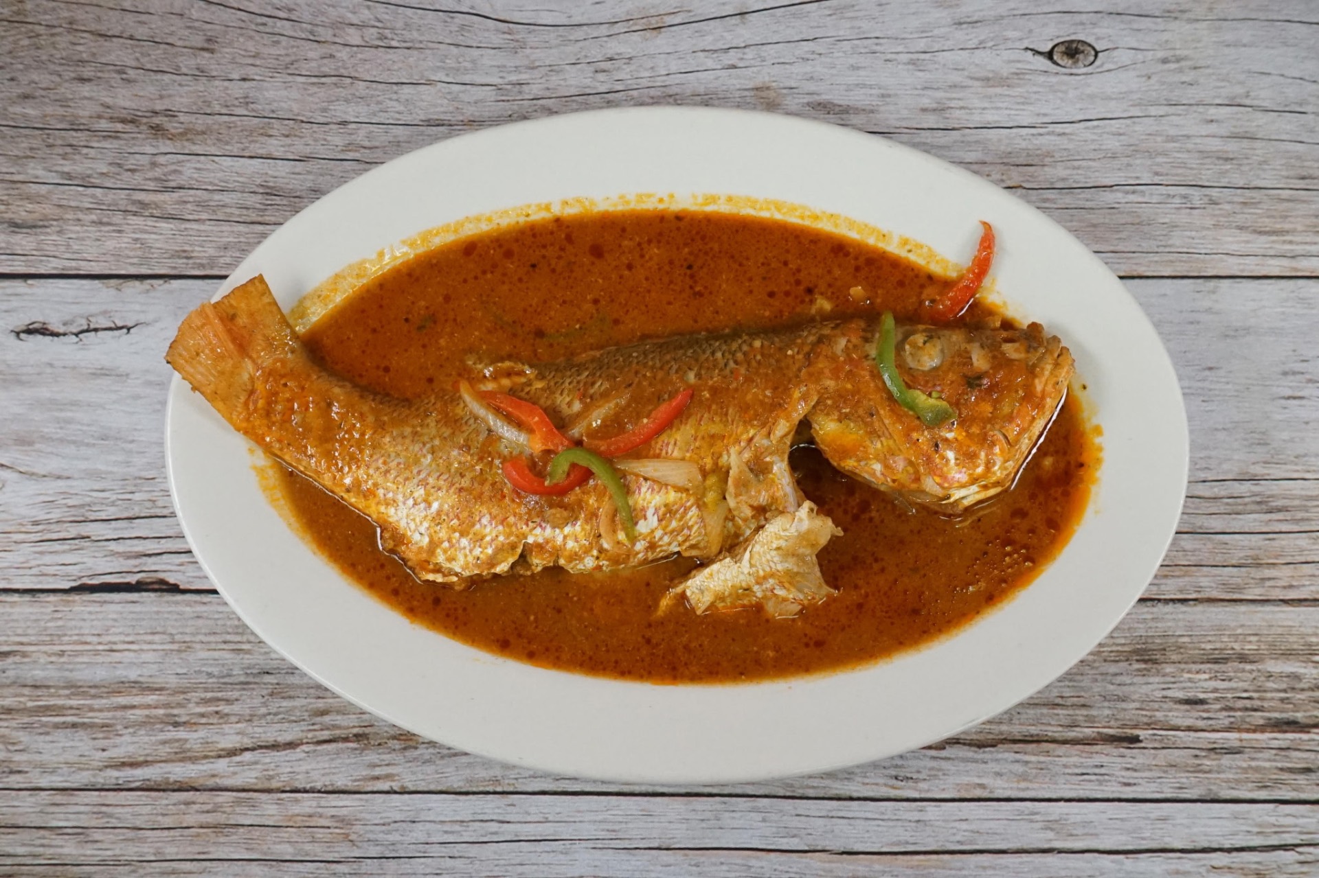 Whole snapper in Creole sauce