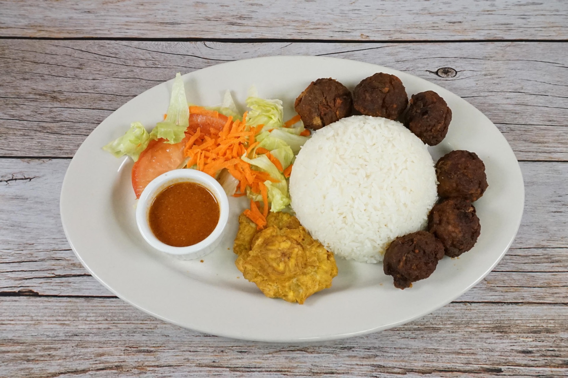 Haitian boulet meatballs with rice